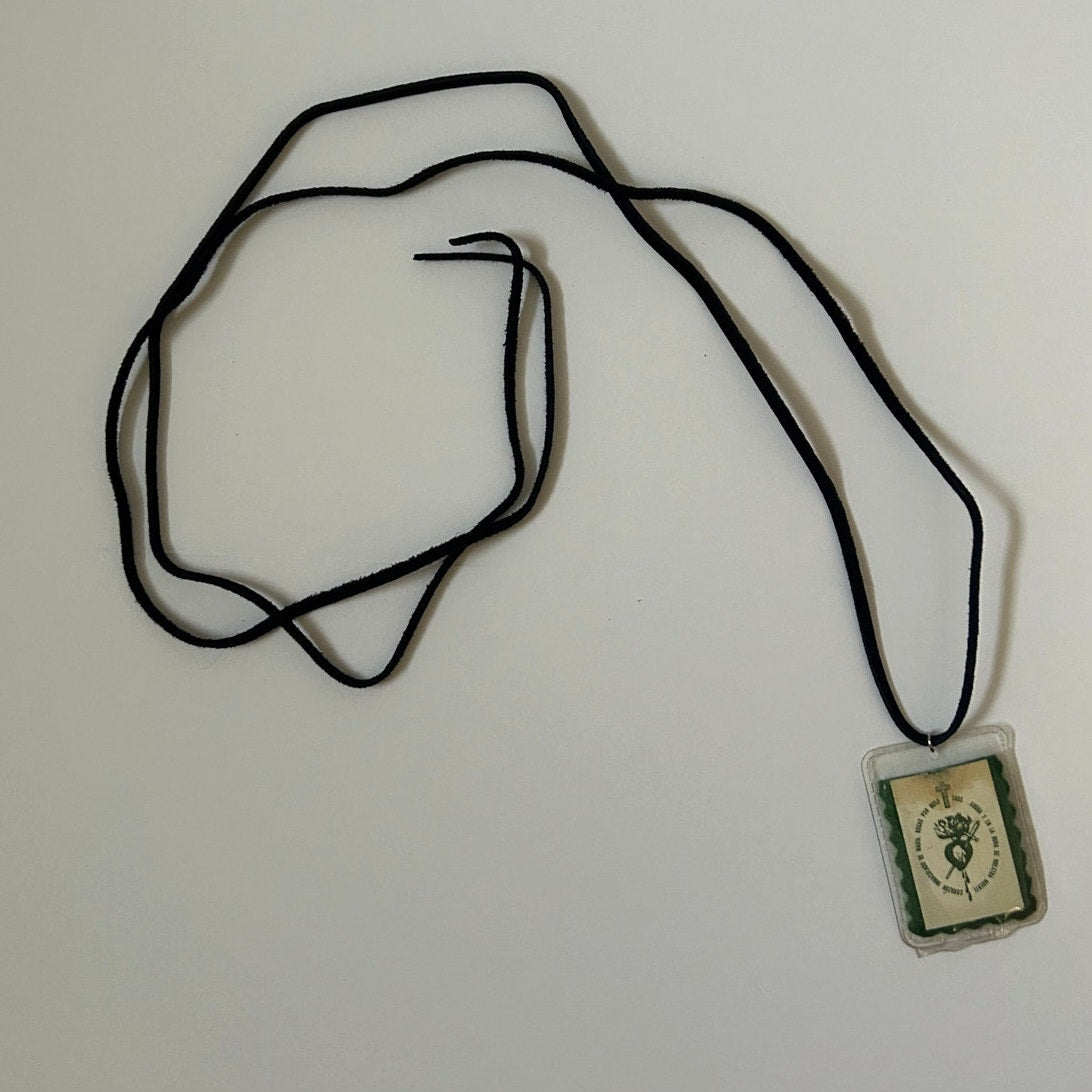 Sacred heart prayer card necklace